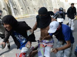 Cuatro muertos en disturbios previos a marchas en Venezuela