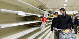 Reino Unido revisará su política de contención del coronavirus ante su expansión