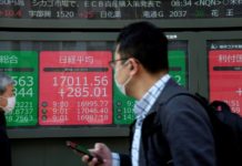 Mercados logran cerrar en verde tras masivas ayudas de gobiernos y bancos centrales