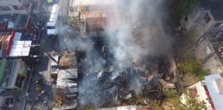 Sistema 9-1-1 informa que fue extinguido incendio en taller de ebanistería en Santiago