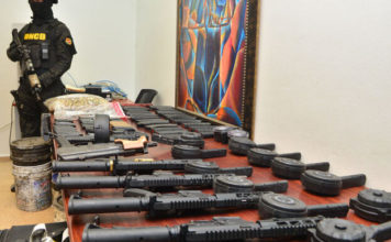 Autoridades ocupan armas y millones de pesos y dólares en Santiago