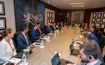 FMI y Banreservas analizan perspectivas económicas y financieras de RD